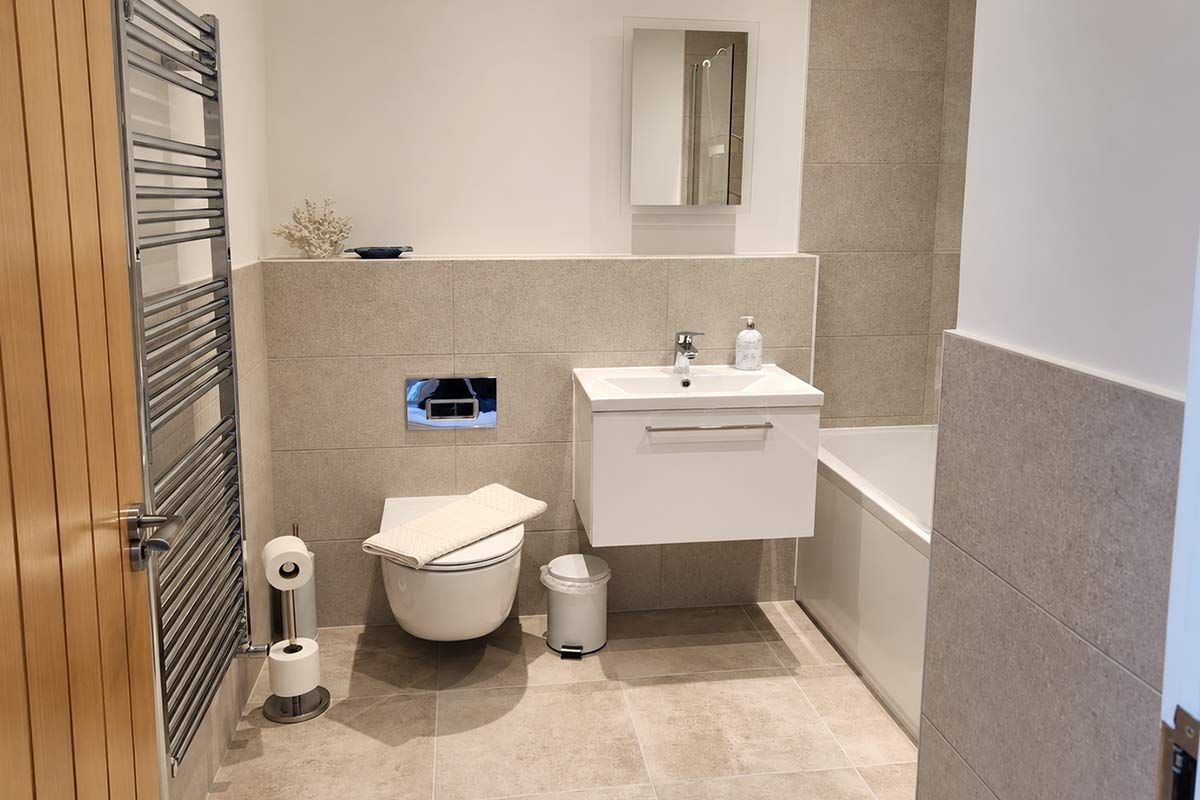 Clean modern tiled bathroom after a sparkle clean in Weymouth